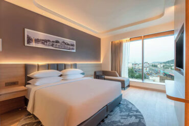 How are suite rooms different from premium rooms in Vellore?