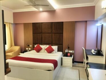 How early should I book suite rooms during peak season in Vellore?