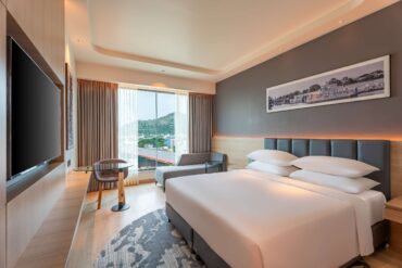 How can I compare hotel room options in Vellore before booking?