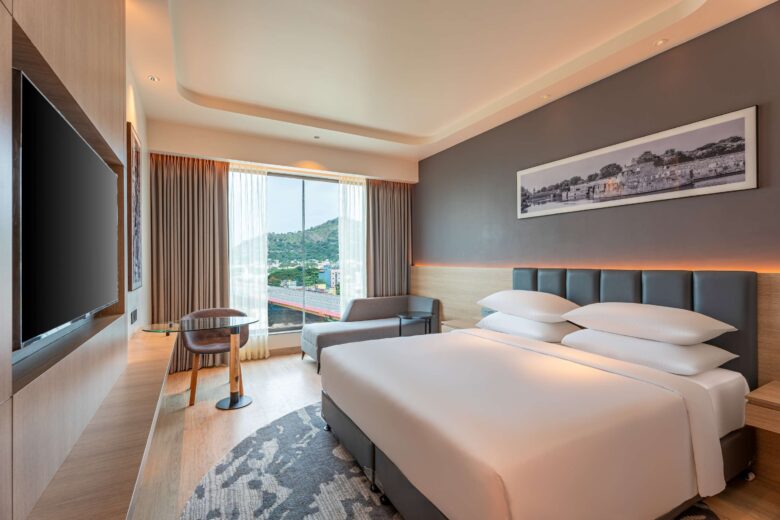 How can I compare hotel room options in Vellore before booking?