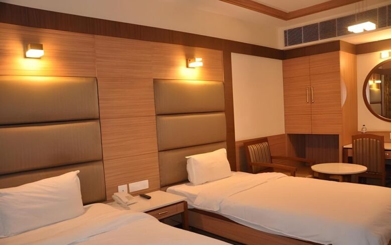 What factors should I consider when selecting Hotel Rooms in Vellore for a long stay?