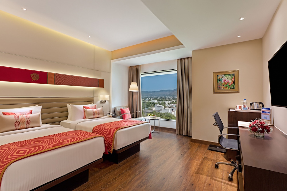 How do I book Hotel Rooms in Vellore at the best price?