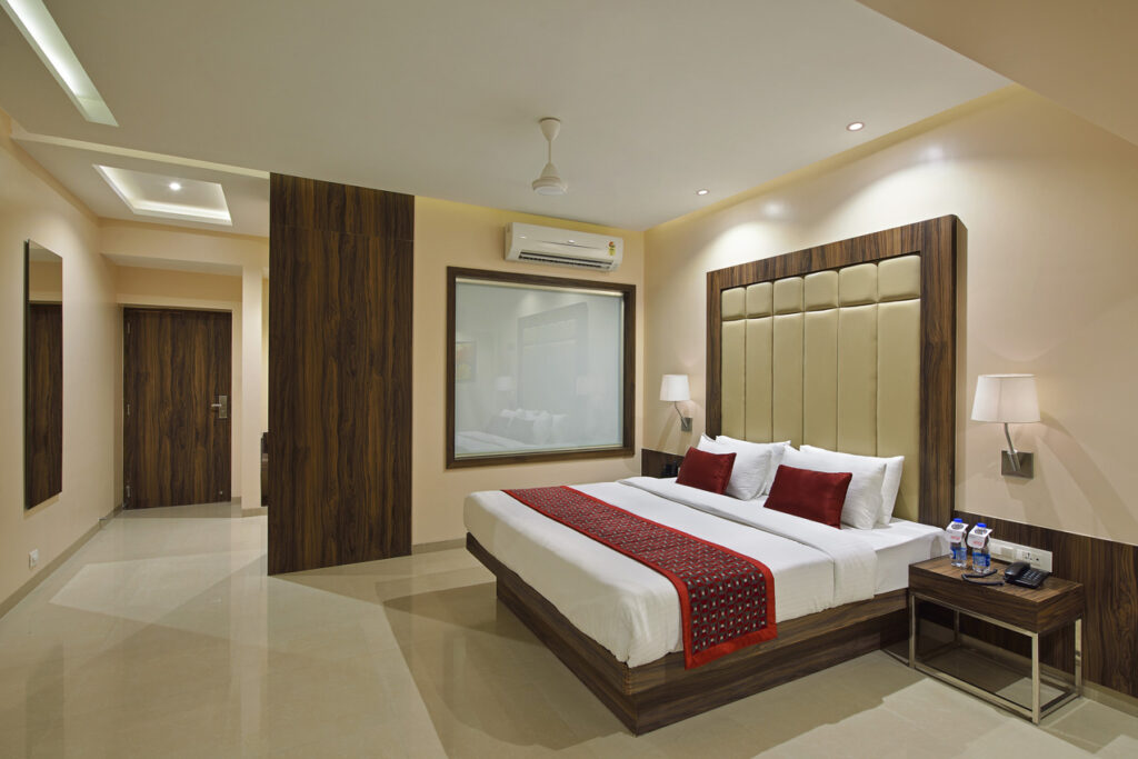 What documents are required to book a hotel room in Vellore?