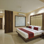 What documents are required to book a hotel room in Vellore?