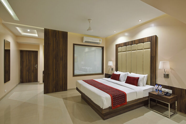 What documents are required to book a hotel room in Vellore?